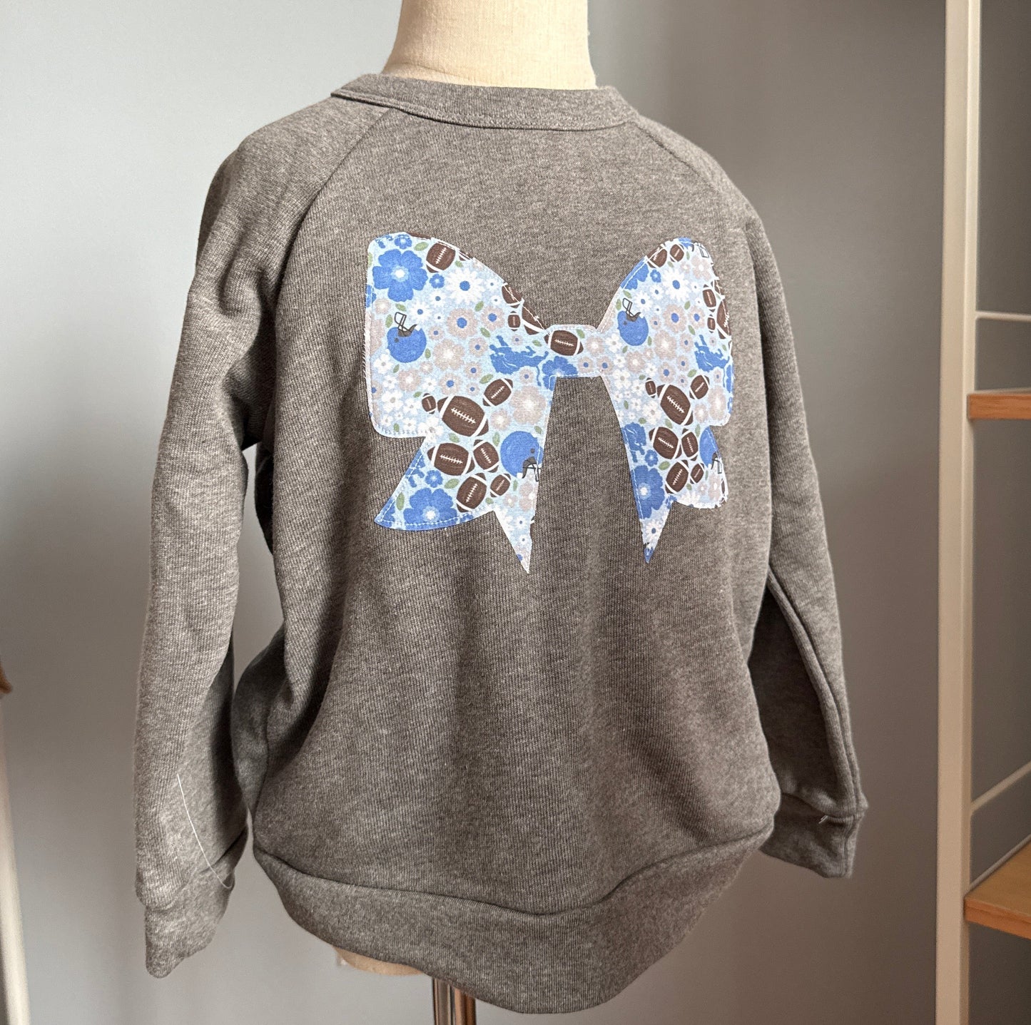 Lions Bow Applique Sweatshirt